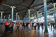 A queue of passengers in an airport