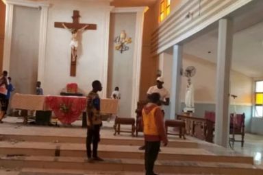 A Nigerian court has handed down death sentences to four men behind a bloodcurdling church massacre. Archive picture shows the aftermath of the incident
