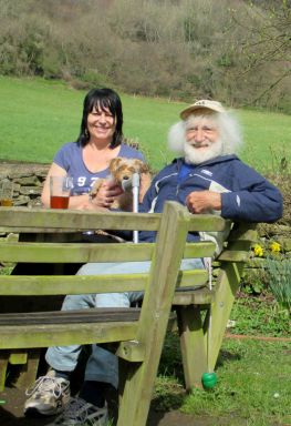 Caroline with her father John, 87, who reported being attacked by the demon