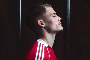 New Liverpool signing Florian Wirtz wears the new Reds' shirt