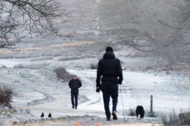 It may nearly be Spring - but Britain is facing snow showers and plunging temperatures