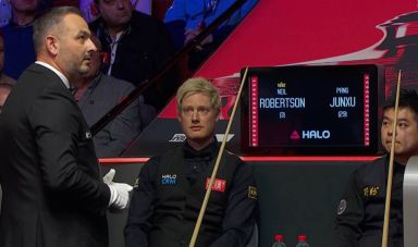 Neil Robertson in discussion with referee Terry Camilleri about the concession
