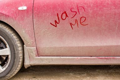 the inscription on a dirty car, wash me
