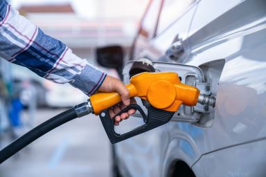 Man filling up car with petrol