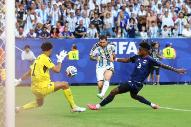 Lionel Messi of Argentina scores against Cape Verde