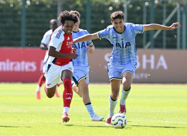 Louis Zecevic John of Arsenal takes on Elijah Upson of Tottenham during the U18 PL match between Arsenal U18 and Tottenham Hotspur U18 at Sobha Realty Training Centre