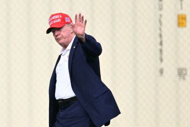 US President Donald Trump waves as he walks to his motorcade after exiting Marine One on the Ellipse near the White House on August 16, 2026. President Trump is returning to the White House after spending the weekend at his golf club in New Jersey. (Photo by Mandel NGAN / AFP via Getty Images)