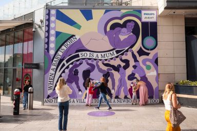 'A Mum is Born' campaign mural