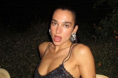 Dua Lipa slips into bikini held together by string for sweaty sunbed session