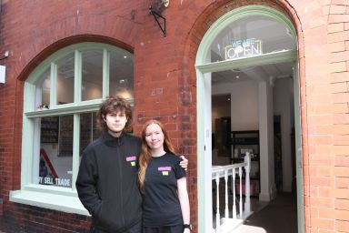 Levi Bailey and Keira Reid outside their Southport shop