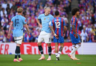 LONDON, ENGLAND - MAY 17: Erling Haaland of Manchester City interacts with Daniel Munoz of Crystal Palace during the Emirates FA Cup Final match between Crystal Palace and Manchester City at Wembley Stadium on May 17, 2025 in London, England. (Photo by Michael Regan - The FA/The FA via Getty Images)