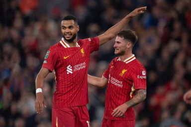 Cody Gakpo of Liverpool celbrates scoring his first goal with Alexis MacAllister during the Carabao Cup Third Round match between Liverpool and West Ham United