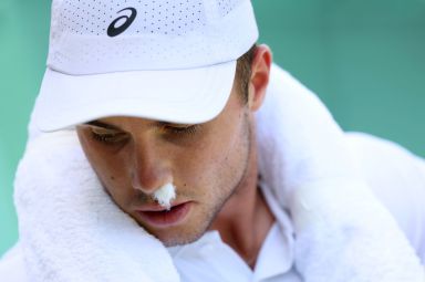 Arthur Fery of Great Britain takes a medical time-out as a result of a nose bleed against Zizou Bergs of Belgium during their Gentlemen's Singles third round match on day six of The Championships Wimbledon 2026 at All England Lawn Tennis and Croquet Club on July 04, 2026 in London, England. 